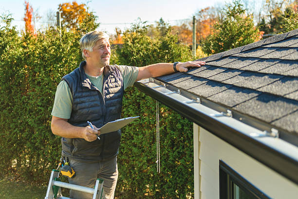 Professional Hail Damage Roof Repair technician working in Saint Cloud, FL